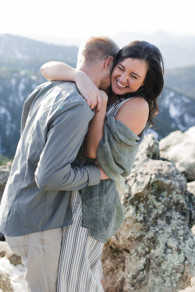 Boulder couple hugging and laughing