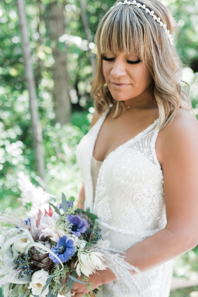 Bride holding flowers in Beaver Creek
