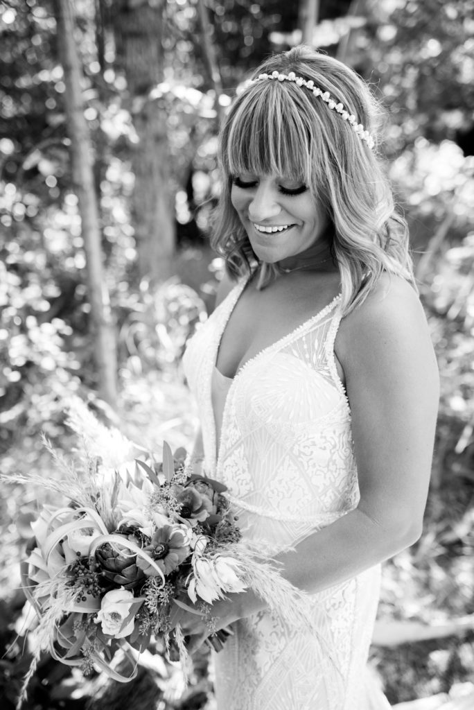 Bride holding flowers in Beaver Creek Black and white