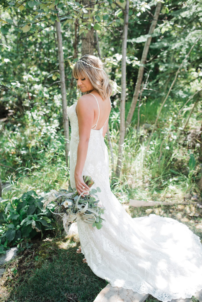 Bride holding flowers in Beaver Creek