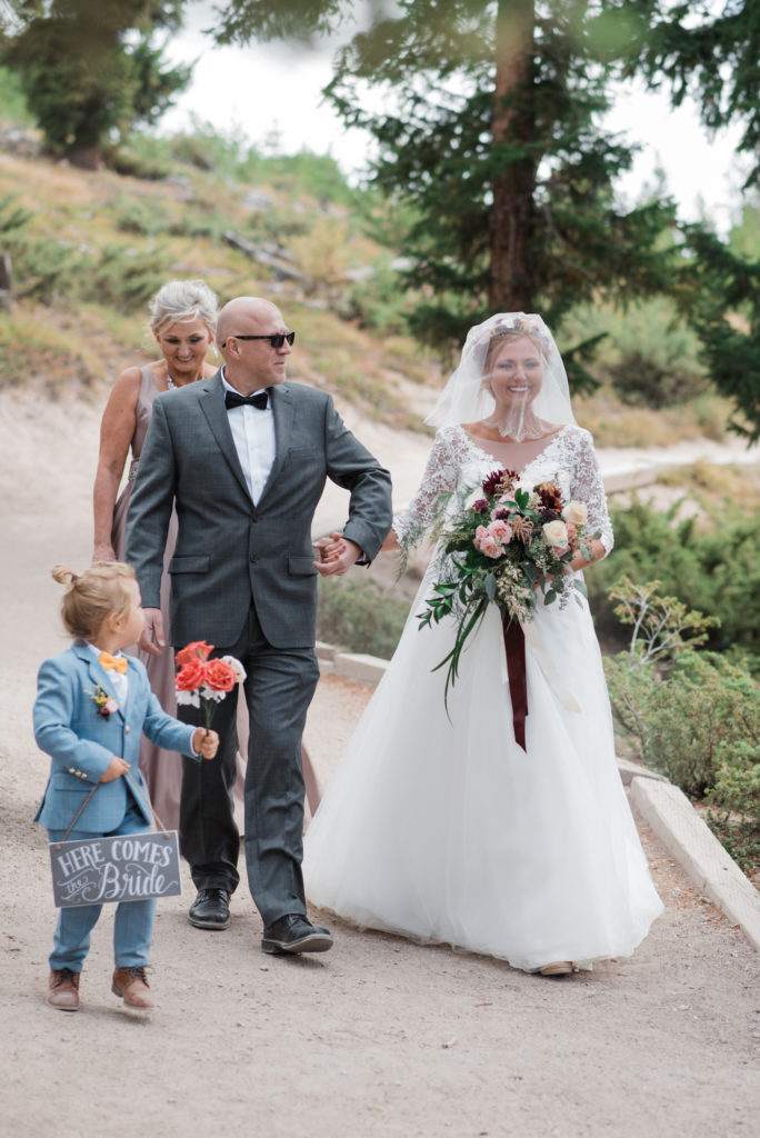 Klaudia and her dad walking down the aisle