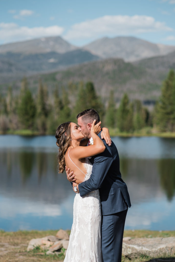 Kathryn and Phil kissing at Grand Lake Wedding