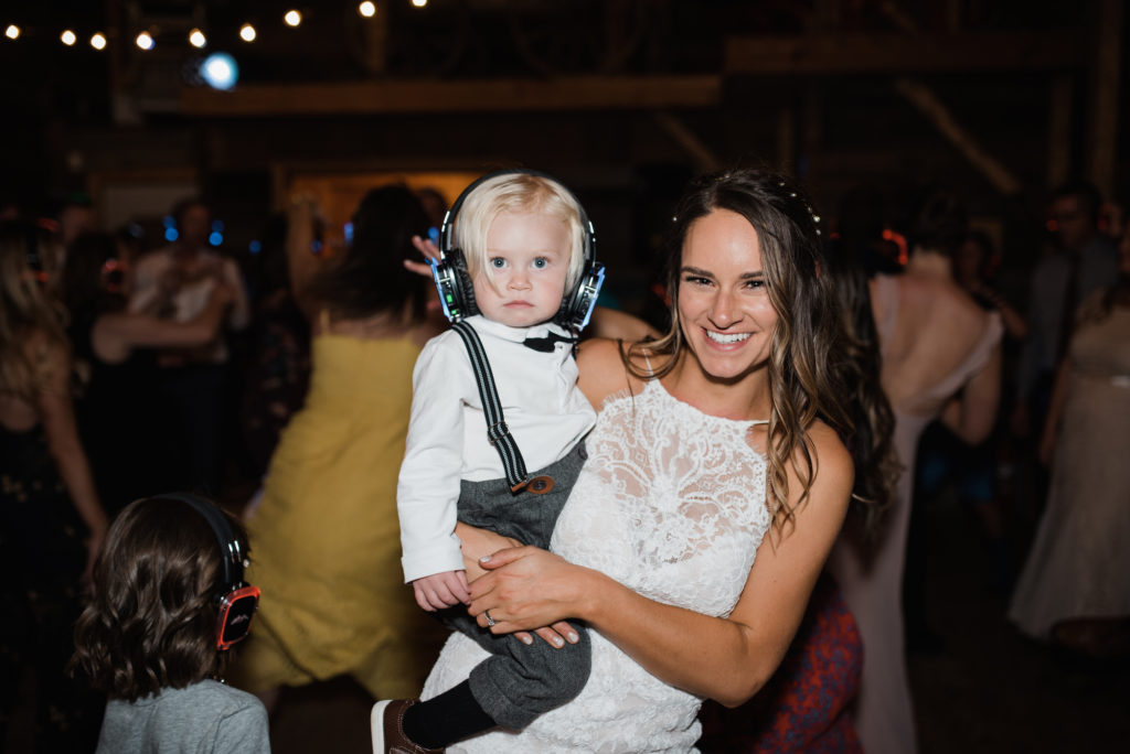 Kathryn holding nephew at reception