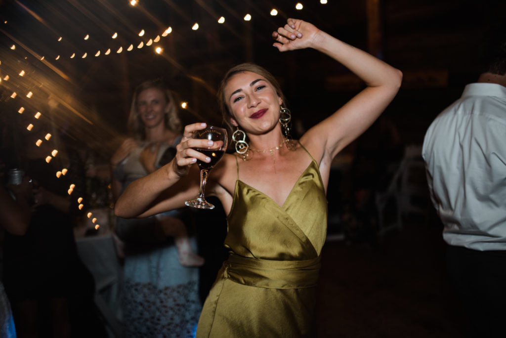 Girl dancing at Grand Lake wedding reception