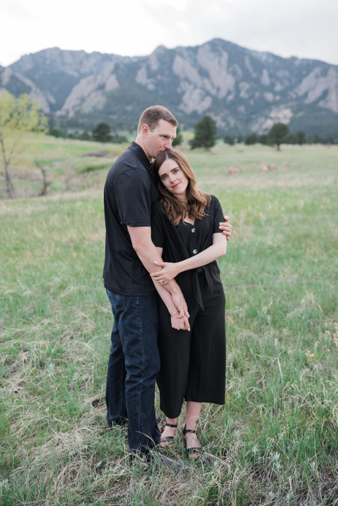 Catherine and Zach in field at Boulder engagement
