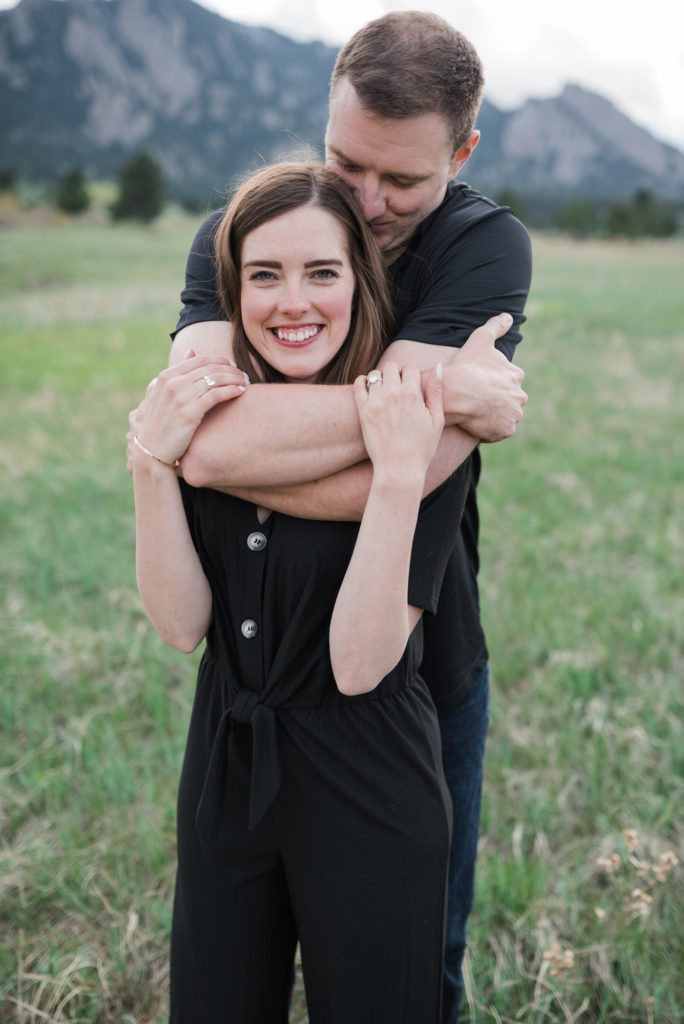 Catherine and Zach bear hug at Boulder engagement