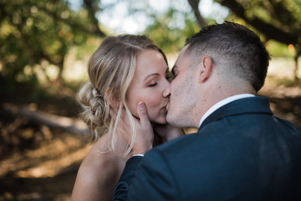 Emily and Andrew kissing at Heber City wedding