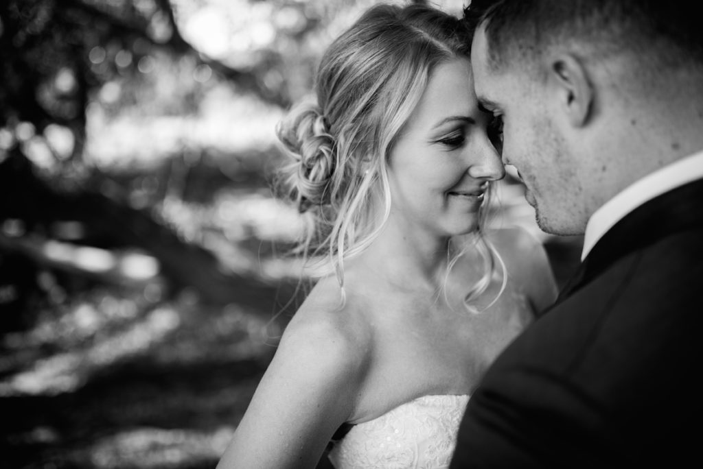 Emily and Andrew kissing at Heber City wedding black and white