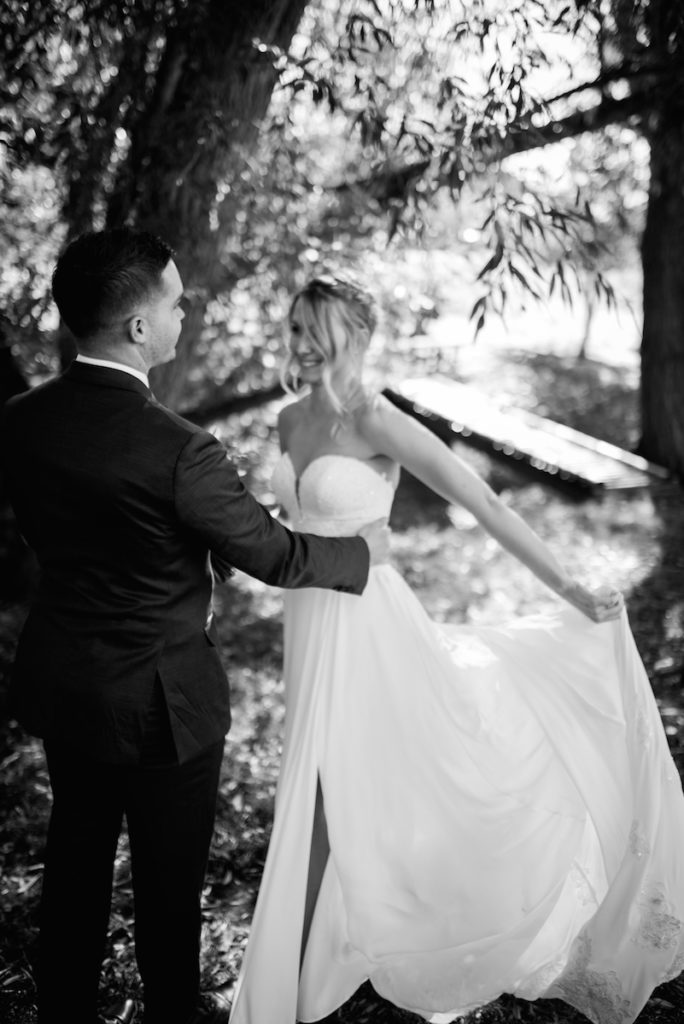Emily and Andrew at first look at Heber City wedding black and white