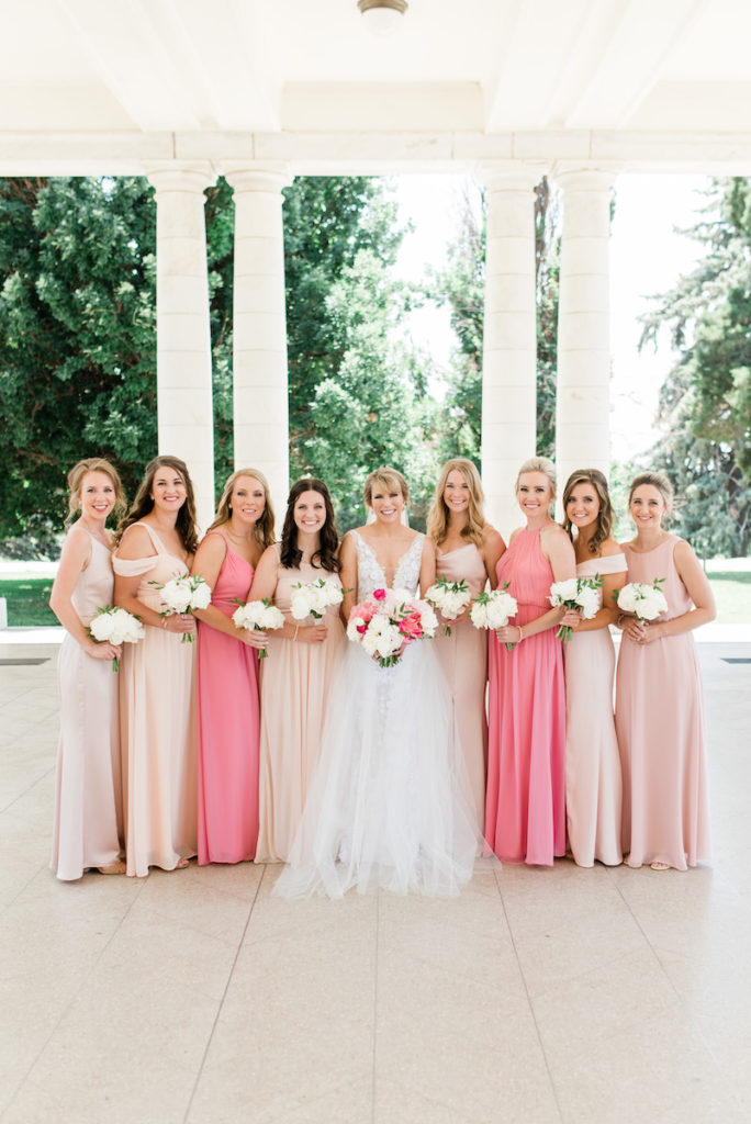 Bridesmaids at Denver botanic garden wedding in blush dresses