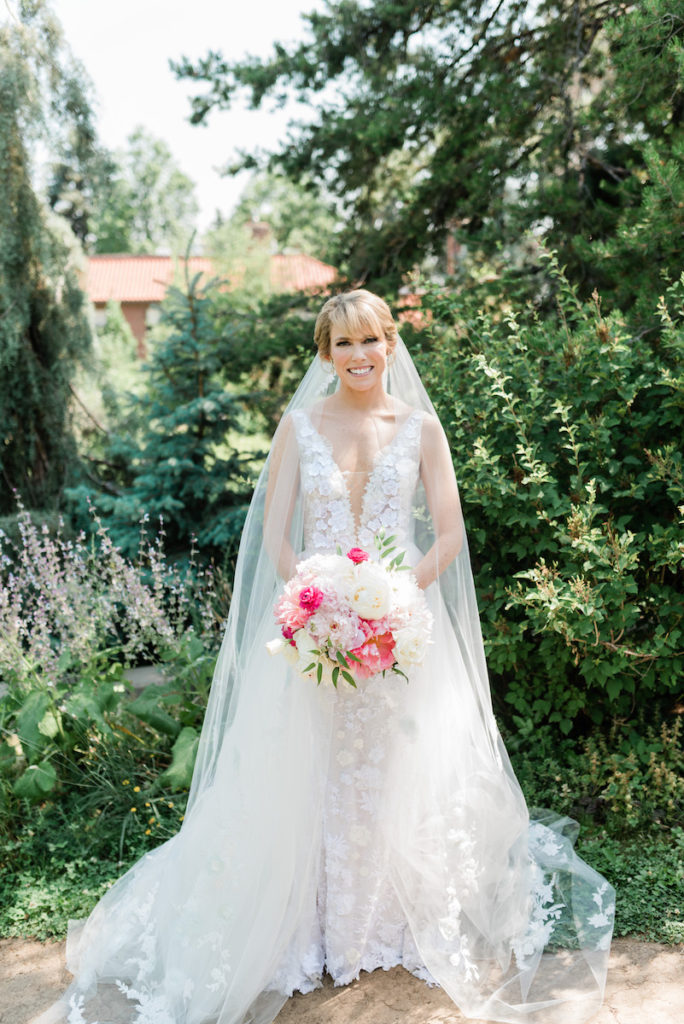 Bride in Mira Zwillinger dress at Denver Botanic Garden wedding
