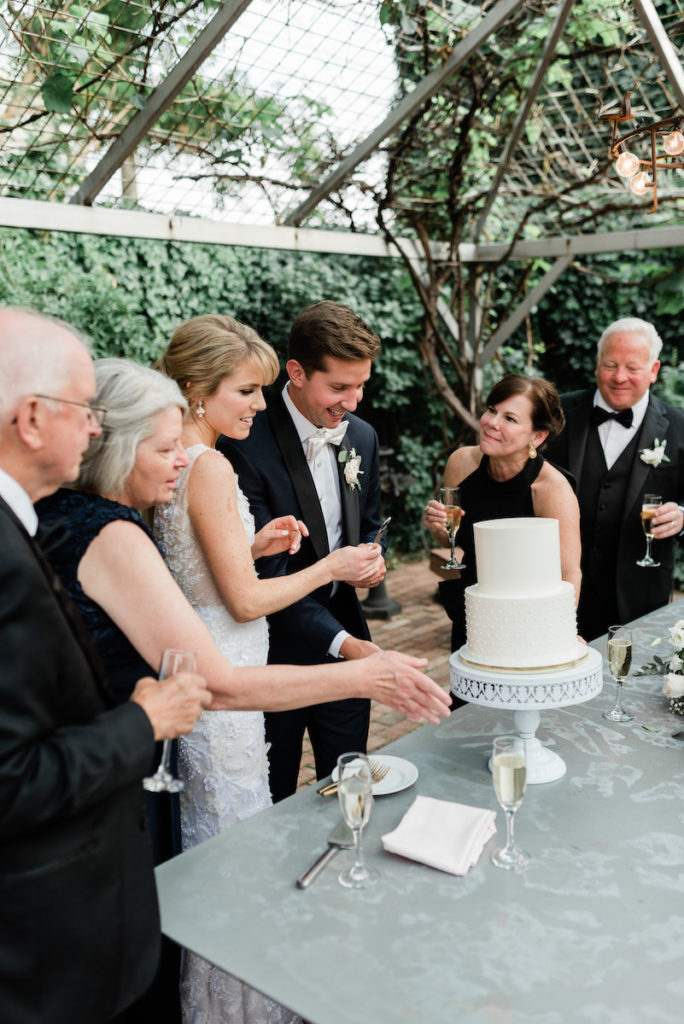 Cake cutting at luxury wedding
