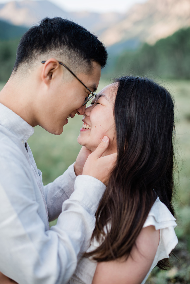 Couple kissing and smiling 