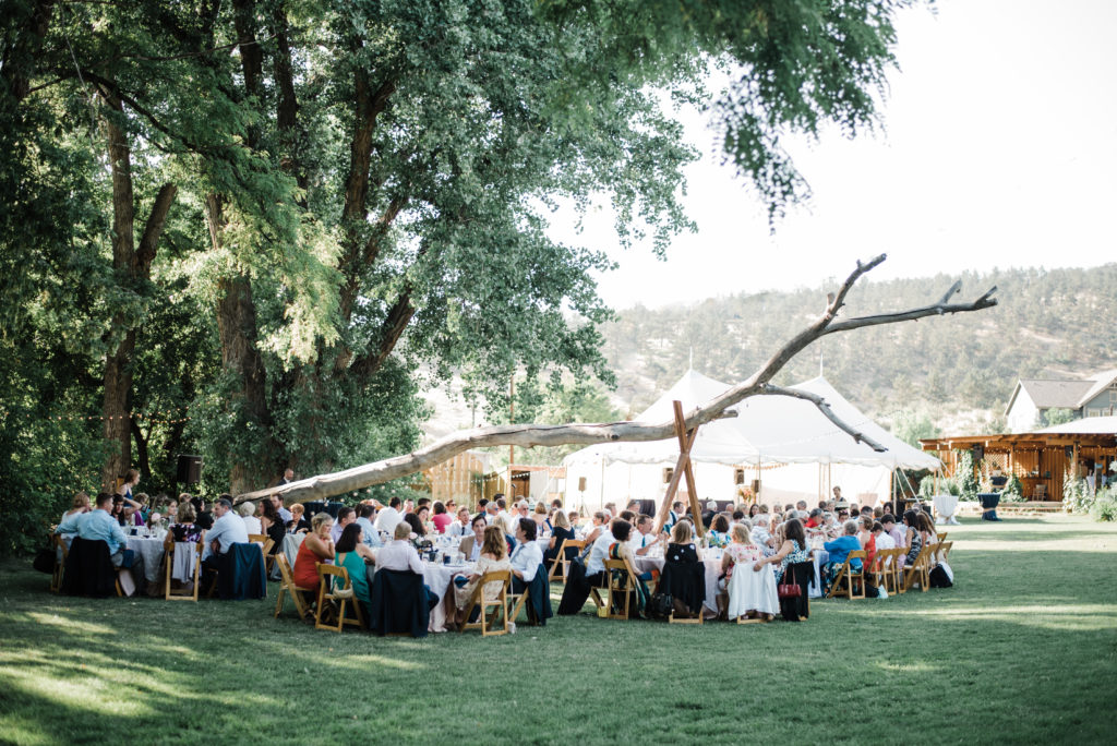 outdoor lyons farmette wedding in colorado ceremony under trees