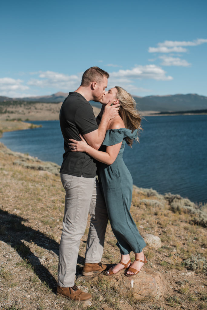 Twin Lakes engagement, kissing with wind
