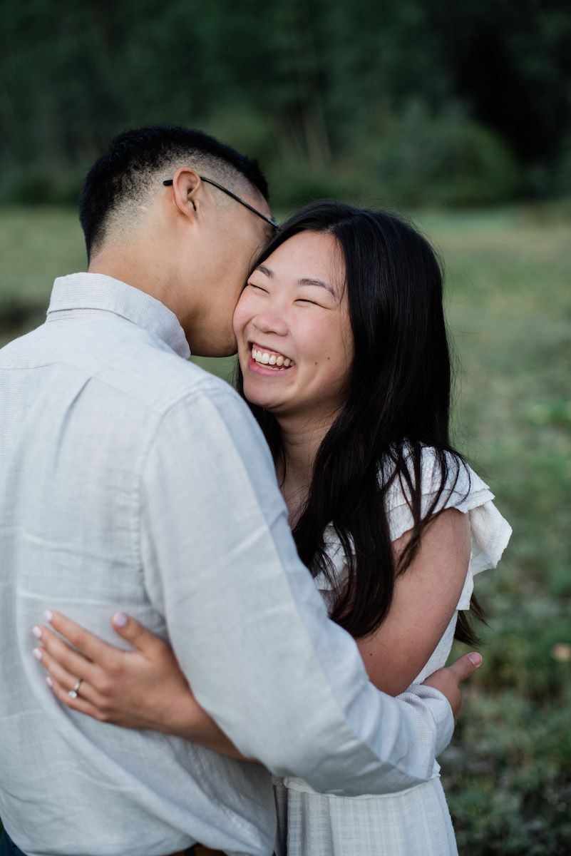 Couple kissing and smiling 